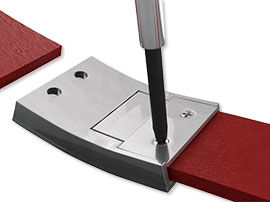 A screwdriver screwing the buckle closed